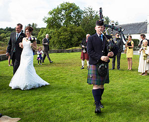 The Skye Piper playing at a wedding on the Isle of Skye